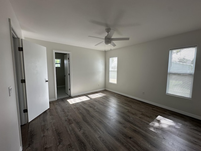 226 SW Statler Ave, Port Saint Lucie, FL 34984 - unfurnished bedroom with dark wood-style floors and a ceiling fan