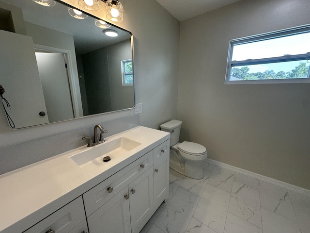 226 SW Statler Ave, Port Saint Lucie, FL 34984 - bathroom featuring marble look tile flooring and vanity