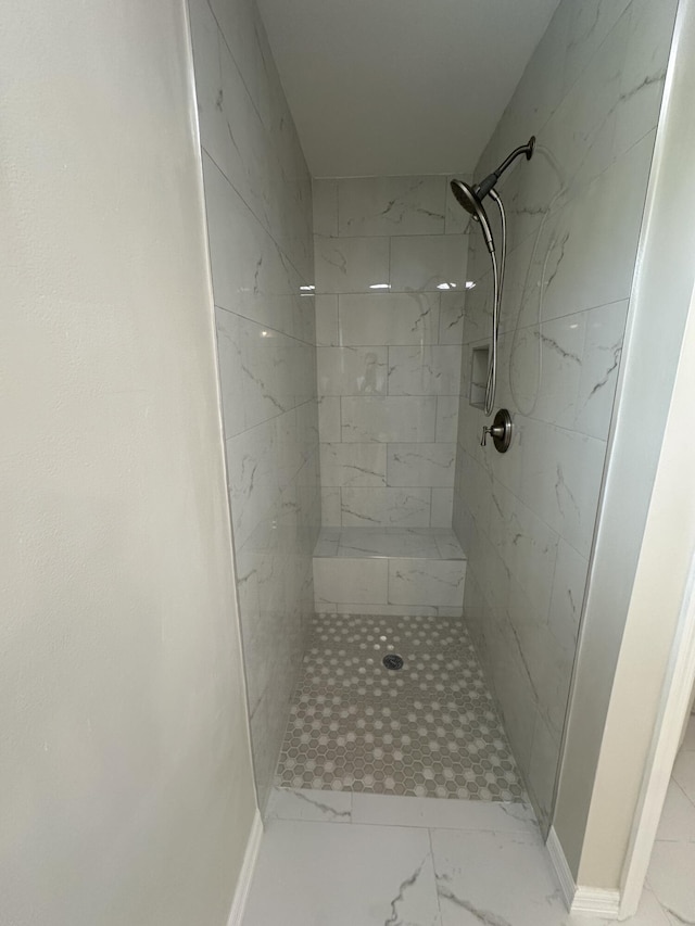 226 SW Statler Ave, Port Saint Lucie, FL 34984 - bathroom with marble finish flooring and tiled shower