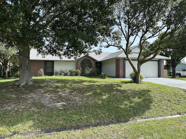 226 SW Statler Ave, Port Saint Lucie, FL 34984 - single story home with brick siding, driveway, a garage, and a front yard