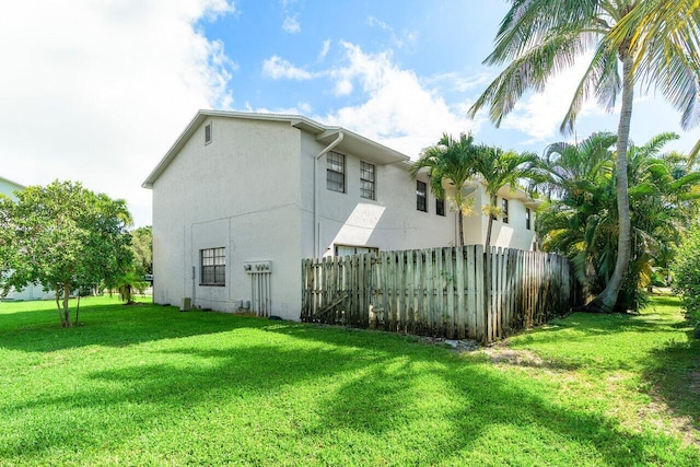 421 N Cypress Dr Unit 15, Tequesta, FL 33469 - view of side of property with stucco siding