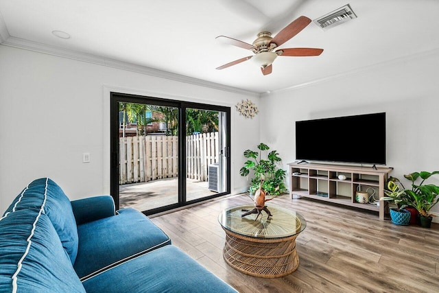 421 N Cypress Dr Unit 15, Tequesta, FL 33469 - living room featuring ornamental molding, wood finished floors, and ceiling fan