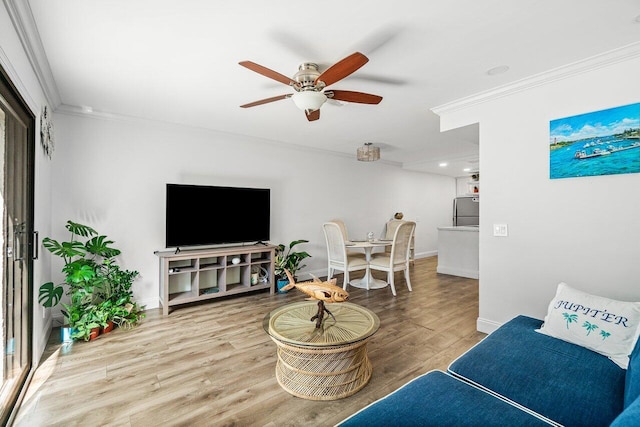 421 N Cypress Dr Unit 15, Tequesta, FL 33469 - living area with ornamental molding, a ceiling fan, wood finished floors, and recessed lighting