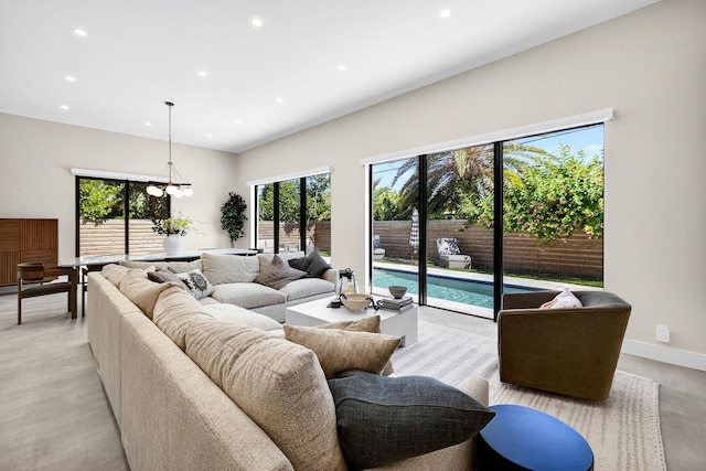 1807 NE 18th St, Fort Lauderdale, FL 33305 - living room featuring recessed lighting and a chandelier