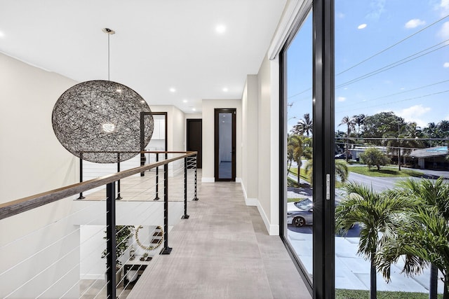1807 NE 18th St, Fort Lauderdale, FL 33305 - corridor with an upstairs landing and recessed lighting