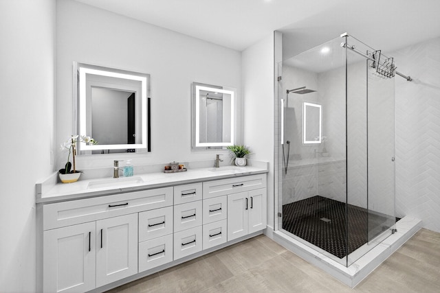 1807 NE 18th St, Fort Lauderdale, FL 33305 - full bath featuring double vanity, a stall shower, wood finished floors, and recessed lighting