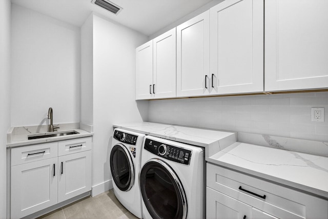 1807 NE 18th St, Fort Lauderdale, FL 33305 - laundry room featuring washer and clothes dryer and cabinet space