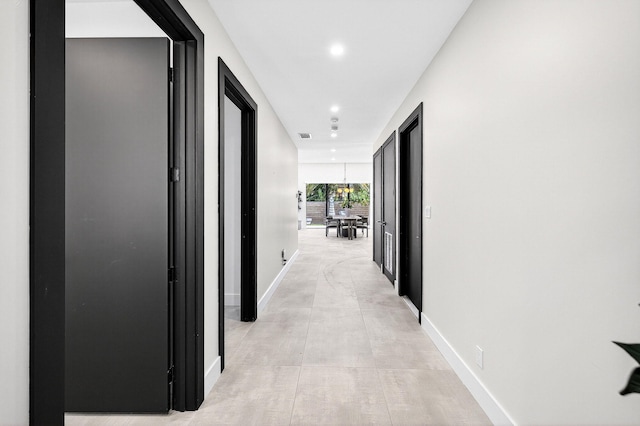 1807 NE 18th St, Fort Lauderdale, FL 33305 - hallway with baseboards and recessed lighting