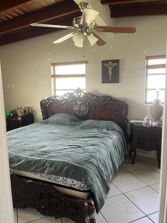 9940 SW 48th St, Miami, FL 33165 - bedroom with light tile patterned floors, beam ceiling, and ceiling fan