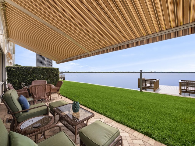 52 Yacht Club Dr Unit 103, North Palm Beach, FL 33408 - view of patio / terrace with a water view