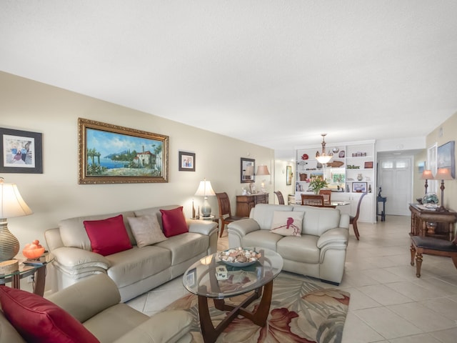 52 Yacht Club Dr Unit 103, North Palm Beach, FL 33408 - living room featuring light tile patterned floors