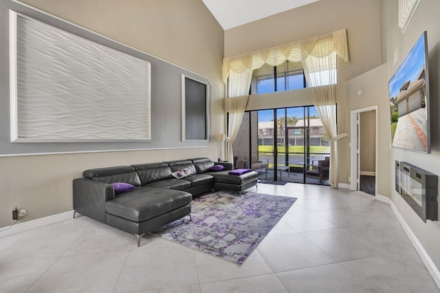 5465 Monterey D Cir Unit D, Delray Beach, FL 33484 - living area featuring a high ceiling and tile patterned floors