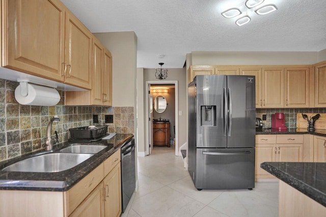 5465 Monterey D Cir Unit D, Delray Beach, FL 33484 - kitchen featuring stainless steel fridge, light brown cabinets, and a textured ceiling