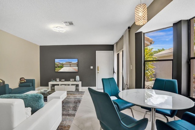 5465 Monterey D Cir Unit D, Delray Beach, FL 33484 - living area featuring a textured ceiling