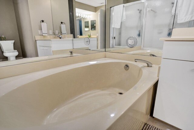 5465 Monterey D Cir Unit D, Delray Beach, FL 33484 - full bathroom featuring a shower stall, a bath, and vanity