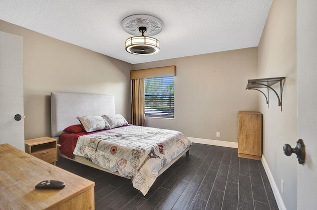 5465 Monterey D Cir Unit D, Delray Beach, FL 33484 - bedroom with dark wood finished floors and a textured ceiling