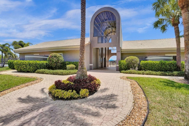5465 Monterey D Cir Unit D, Delray Beach, FL 33484 - view of property featuring curved driveway