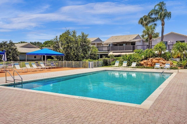 5465 Monterey D Cir Unit D, Delray Beach, FL 33484 - community pool with a patio and a residential view