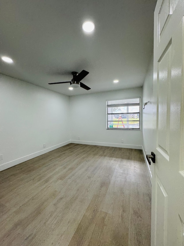 970 Normandy U, Delray Beach, FL 33484 - empty room with recessed lighting, ceiling fan, and wood finished floors
