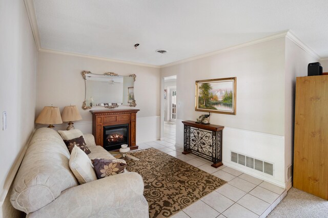 2860 Sheriff Way, Winter Park, FL 32792 - kitchen with stainless steel appliances, light brown cabinets, a tray ceiling, and light tile patterned flooring