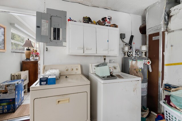 2860 Sheriff Way, Winter Park, FL 32792 - washroom with independent washer and dryer, water heater, and cabinet space