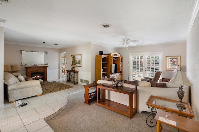 2860 Sheriff Way, Winter Park, FL 32792 - tiled living area featuring ceiling fan, crown molding, and a warm lit fireplace