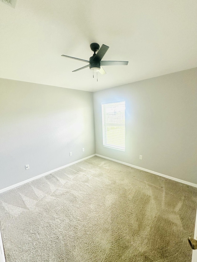 6455 NW Foxglove St, Port Saint Lucie, FL 34986 - spare room with light colored carpet and a ceiling fan