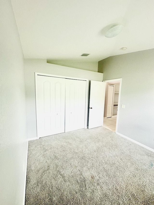6455 NW Foxglove St, Port Saint Lucie, FL 34986 - unfurnished bedroom featuring carpet floors and a closet