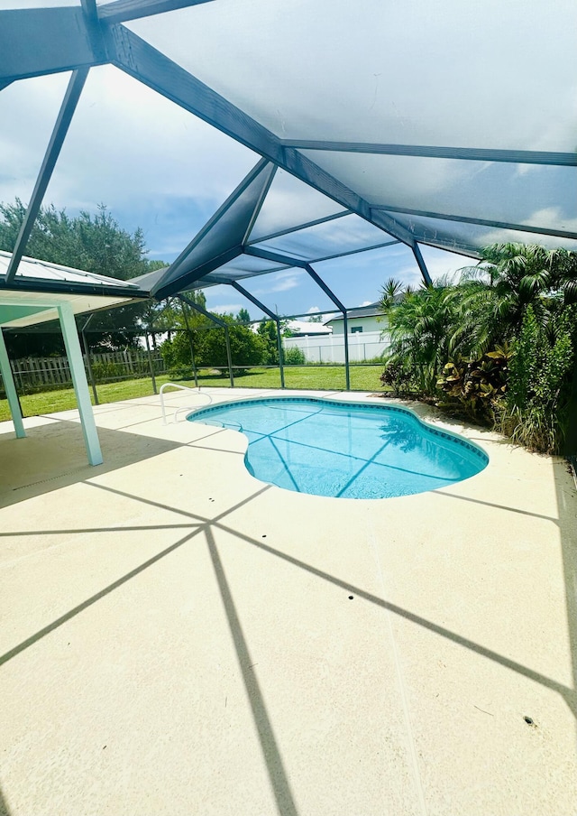 6455 NW Foxglove St, Port Saint Lucie, FL 34986 - view of pool featuring a patio and a lanai
