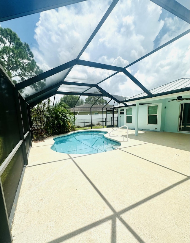 6455 NW Foxglove St, Port Saint Lucie, FL 34986 - swimming pool with a patio and a lanai