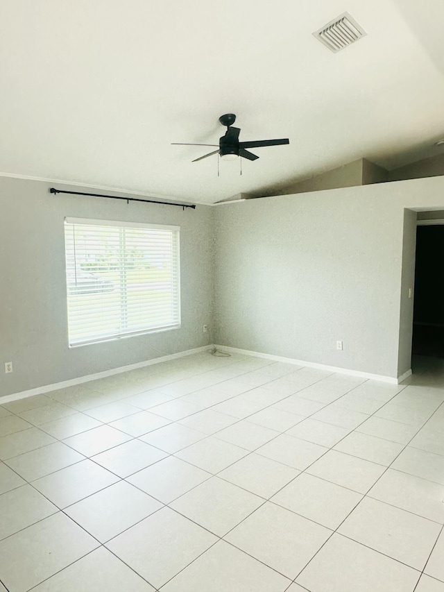 6455 NW Foxglove St, Port Saint Lucie, FL 34986 - empty room featuring a ceiling fan and light tile patterned flooring