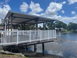 441 Pine Glen Ln Unit B1, Greenacres, FL 33463 - dock with a water view