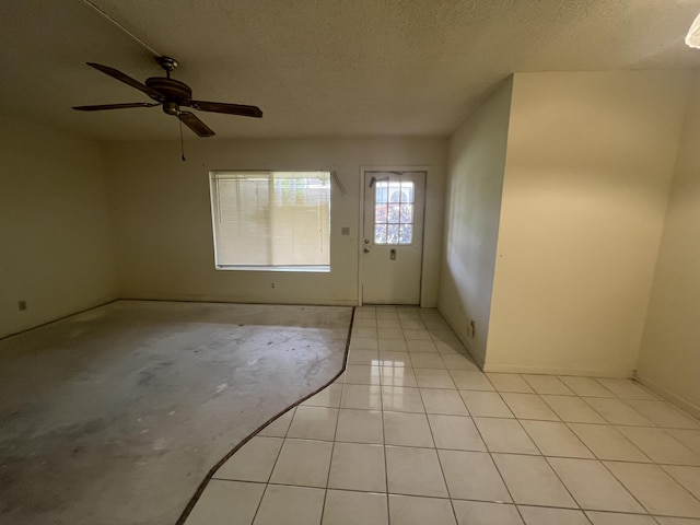 441 Pine Glen Ln Unit B1, Greenacres, FL 33463 - unfurnished room featuring ceiling fan and a textured ceiling