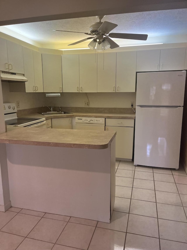 441 Pine Glen Ln Unit B1, Greenacres, FL 33463 - kitchen featuring white appliances, light tile patterned floors, under cabinet range hood, a ceiling fan, and light countertops