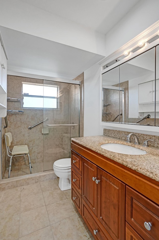9700 Sunrise Lakes Blvd Unit 305, Sunrise, FL 33322 - bathroom with vanity, a shower stall, and tile patterned floors