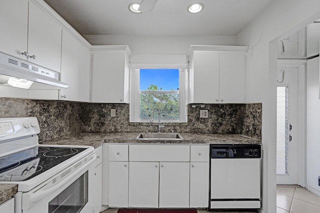 9700 Sunrise Lakes Blvd Unit 305, Sunrise, FL 33322 - kitchen with white appliances, under cabinet range hood, white cabinetry, tasteful backsplash, and recessed lighting