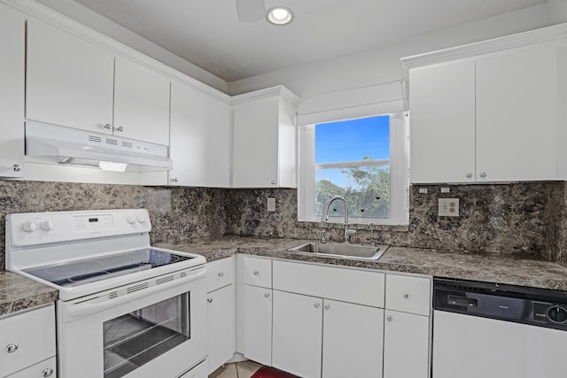 9700 Sunrise Lakes Blvd Unit 305, Sunrise, FL 33322 - kitchen featuring white appliances, under cabinet range hood, white cabinetry, decorative backsplash, and recessed lighting