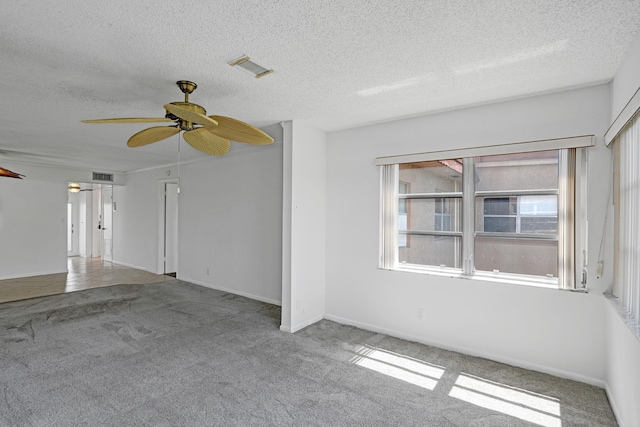 9700 Sunrise Lakes Blvd Unit 305, Sunrise, FL 33322 - carpeted empty room with a textured ceiling and ceiling fan