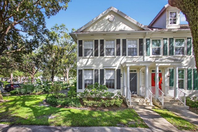 274 Murray Ct, Jupiter, FL 33458 - townhome / multi-family property with a front lawn