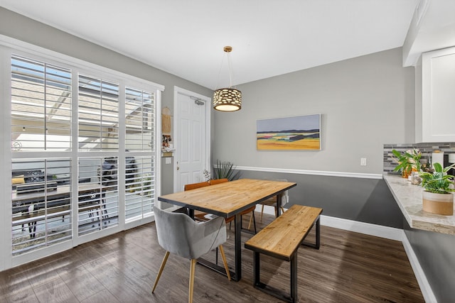 274 Murray Ct, Jupiter, FL 33458 - dining room featuring baseboards and dark wood-style floors
