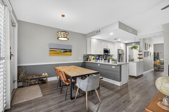274 Murray Ct, Jupiter, FL 33458 - dining area with dark wood finished floors and recessed lighting