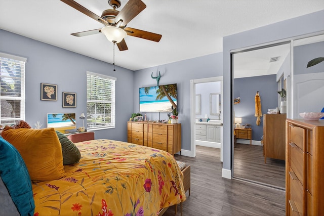 274 Murray Ct, Jupiter, FL 33458 - bedroom featuring dark wood-style flooring, ensuite bath, and a ceiling fan