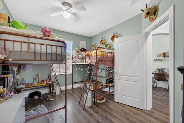 274 Murray Ct, Jupiter, FL 33458 - bedroom with wood finished floors and ceiling fan
