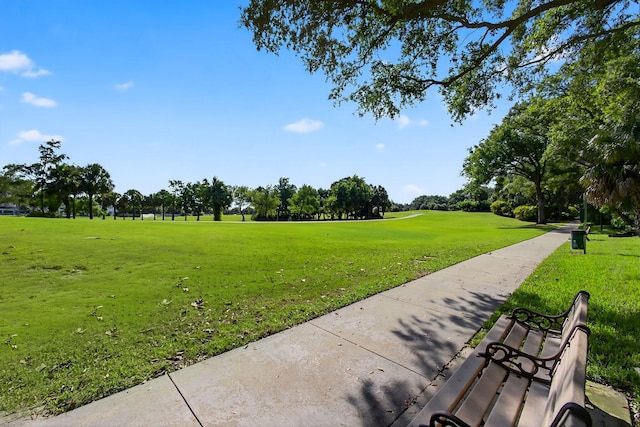 274 Murray Ct, Jupiter, FL 33458 - surrounding community with a yard, golf course view, and view of wooded area