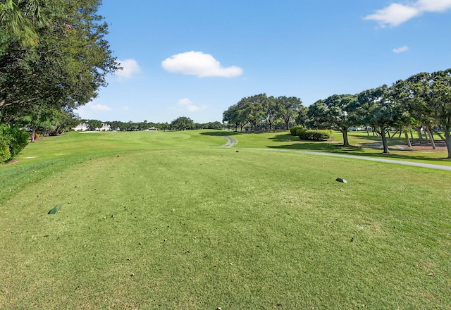 274 Murray Ct, Jupiter, FL 33458 - surrounding community with golf course view and a lawn
