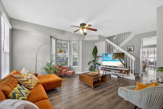 274 Murray Ct, Jupiter, FL 33458 - living area featuring stairway, healthy amount of natural light, a ceiling fan, and wood finished floors