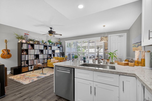 274 Murray Ct, Jupiter, FL 33458 - kitchen with dishwasher, ceiling fan, white cabinets, dark wood-style floors, and light stone counters