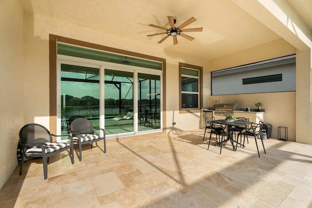 12136 SW Fortezza Way, Port Saint Lucie, FL 34987 - view of patio / terrace with an outdoor kitchen, a ceiling fan, and outdoor dining area