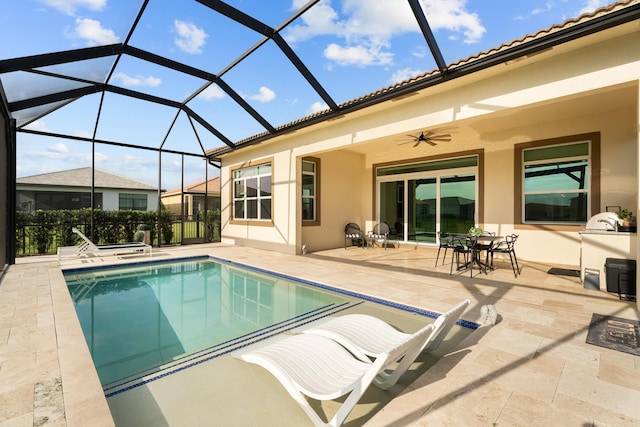 12136 SW Fortezza Way, Port Saint Lucie, FL 34987 - swimming pool featuring a ceiling fan, a patio area, and glass enclosure