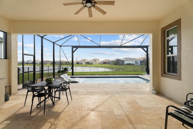 12136 SW Fortezza Way, Port Saint Lucie, FL 34987 - view of patio / terrace featuring a water view, a ceiling fan, glass enclosure, and a residential view